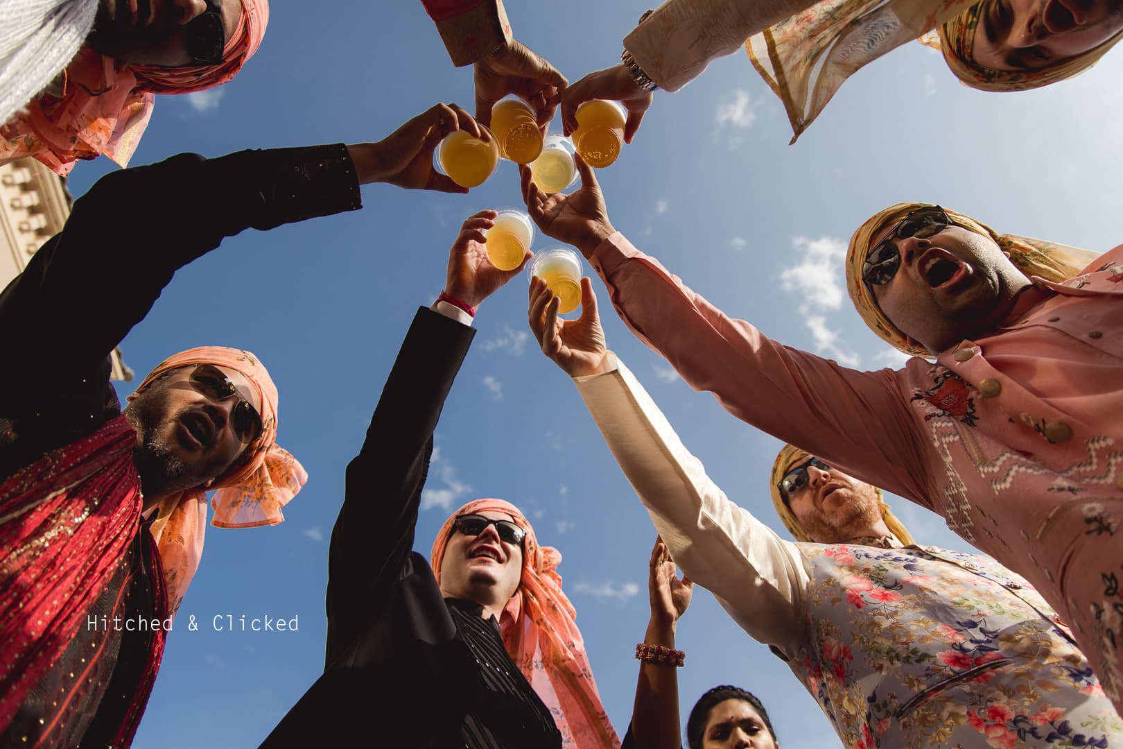 Wedding guests raising a celebratory toast together